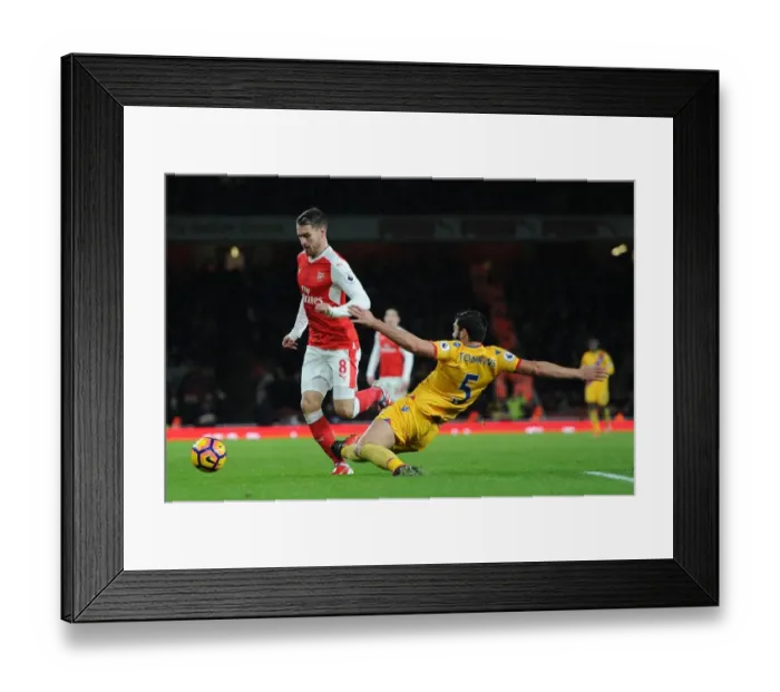 Framed Print : Arsenal's Aaron Ramsey Fouls by Crystal Palace's James Tomkins in Premier League Clash Framed Print : Arsenal's Aaron Ramsey Fouls by Crystal Palace's James Tomkins in Premier League Clash