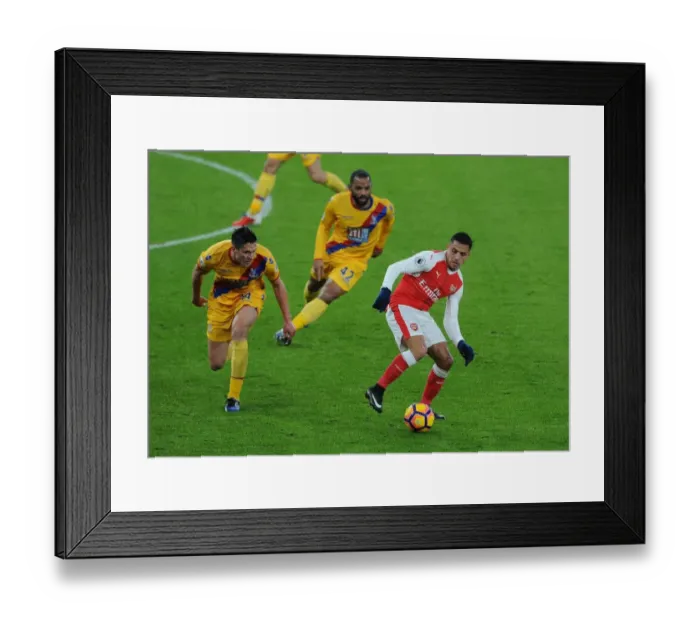 Framed Print : Arsenal's Alexis Sanchez Faces Off Against Crystal Palace's Martin Kelly and Jason Puncheon during the 2016-17 Premier League Match