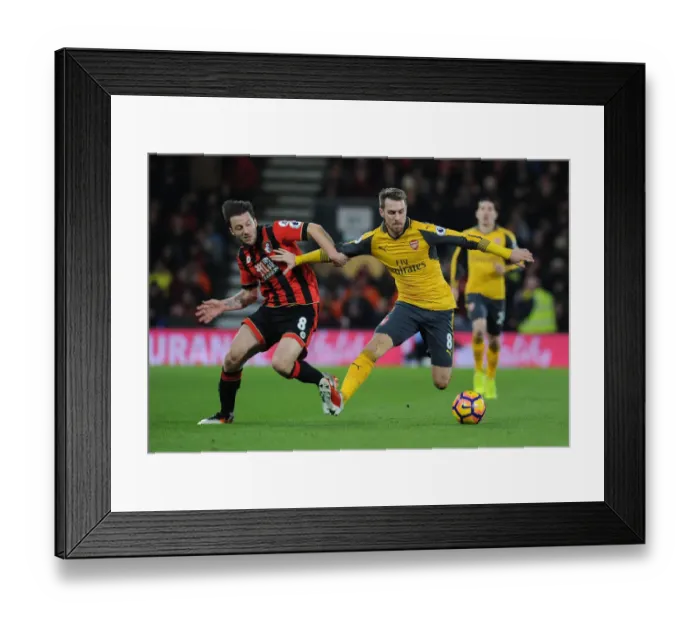 Framed Print : Ramsey vs. Arter: Intense Battle in AFC Bournemouth vs. Arsenal Premier League Clash