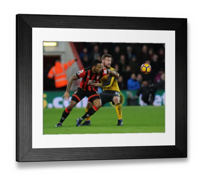 Framed Print : Mustafi vs Wilson: Intense Clash Between AFC Bournemouth and Arsenal in Premier League (January 2017)