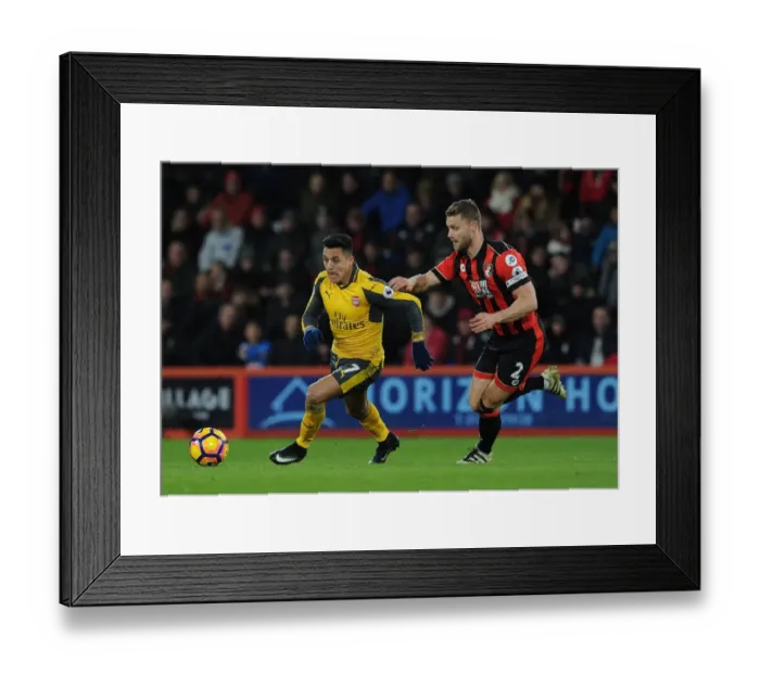 Framed Print : Clash of Titans: Alexis Sanchez vs. Simon Francis - Premier League Battle at Vitality Stadium