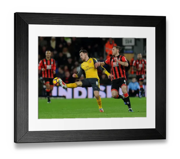 Framed Print : Aaron Ramsey Faces Off Against Dan Gosling: AFC Bournemouth vs. Arsenal, Premier League 2016-17