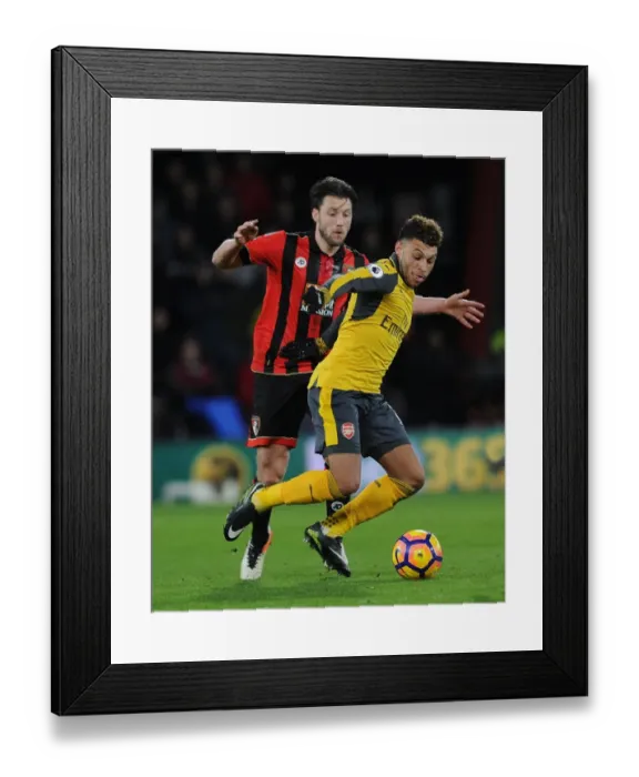 Framed Print : Arsenal's Oxlade-Chamberlain Clashes with Bournemouth's Arter in Premier League Showdown Framed Print : Arsenal's Oxlade-Chamberlain Clashes with Bournemouth's Arter in Premier League Showdown