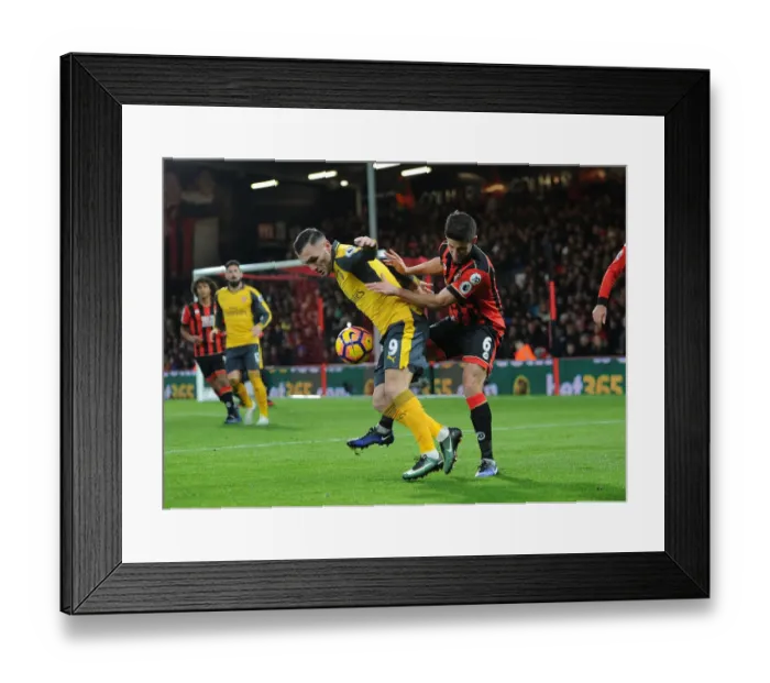 Framed Print : Arsenal's Lucas Perez Faces Pressure from Bournemouth's Andrew Surman in Premier League Clash Framed Print : Arsenal's Lucas Perez Faces Pressure from Bournemouth's Andrew Surman in Premier League Clash