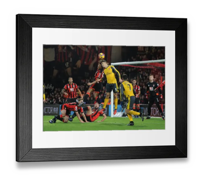 Framed Print : Gabriel vs. Ake: Intense Battle in AFC Bournemouth vs. Arsenal Premier League Clash