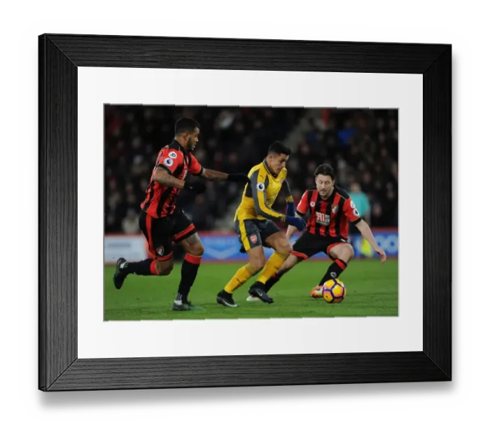 Framed Print : Arsenal's Alexis Sanchez Faces Off Against Bournemouth's Harry Arter and Joshua King in Premier League Clash Framed Print : Arsenal's Alexis Sanchez Faces Off Against Bournemouth's Harry Arter and Joshua King in Premier League Clash