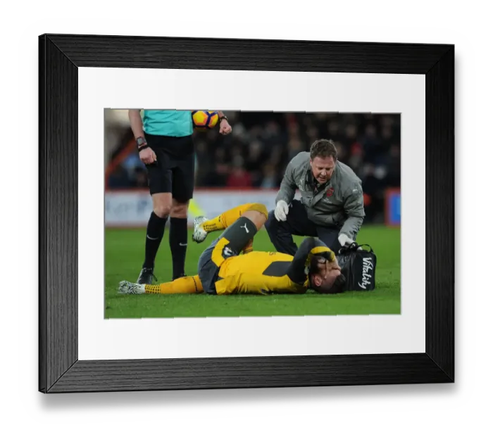 Framed Print : Arsenal's Olivier Giroud Receives Treatment from Physio during AFC Bournemouth Match, 2016-17 Framed Print : Arsenal's Olivier Giroud Receives Treatment from Physio during AFC Bournemouth Match, 2016-17