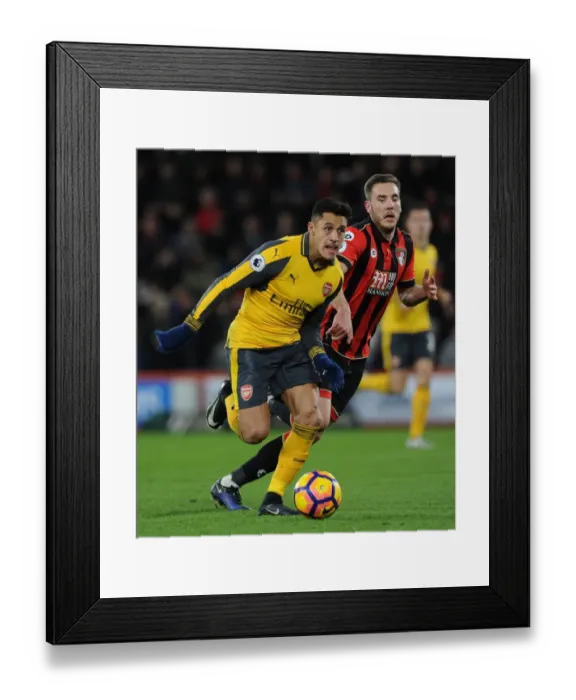 Framed Print : Intense Face-Off: Alexis Sanchez vs. Dan Gosling - Premier League Showdown Framed Print : Intense Face-Off: Alexis Sanchez vs. Dan Gosling - Premier League Showdown