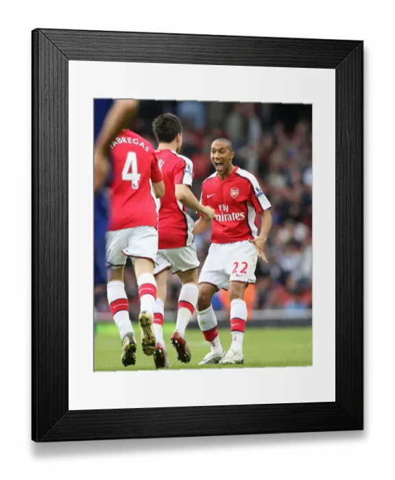 Framed Print : Gael Clichy celebrates the 1st Arsenal goal with scorer Samir Nasri