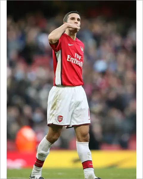 Robin van Persie (Arsenal) blows a kiss to his family after the match
