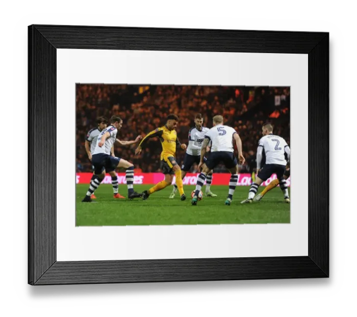 Framed Print : Arsenal's Oxlade-Chamberlain Stands Off Against Preston's Defenders in FA Cup Showdown Framed Print : Arsenal's Oxlade-Chamberlain Stands Off Against Preston's Defenders in FA Cup Showdown