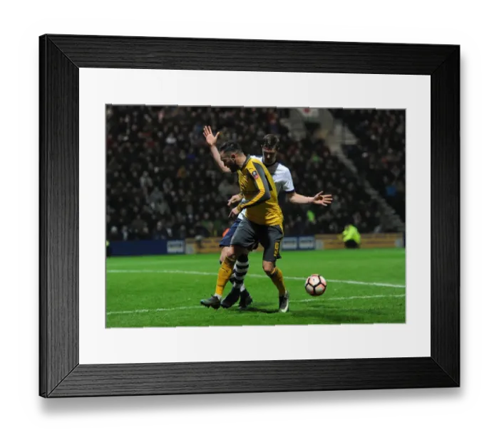 Framed Print : Lucas Perez (Arsenal) back heels the ball for Olivier Guirouds goal under pressure