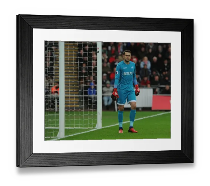 Framed Print : Lukasz Fabianski of Swansea Faces Arsenal in Premier League Clash (January 2017) Framed Print : Lukasz Fabianski of Swansea Faces Arsenal in Premier League Clash (January 2017)