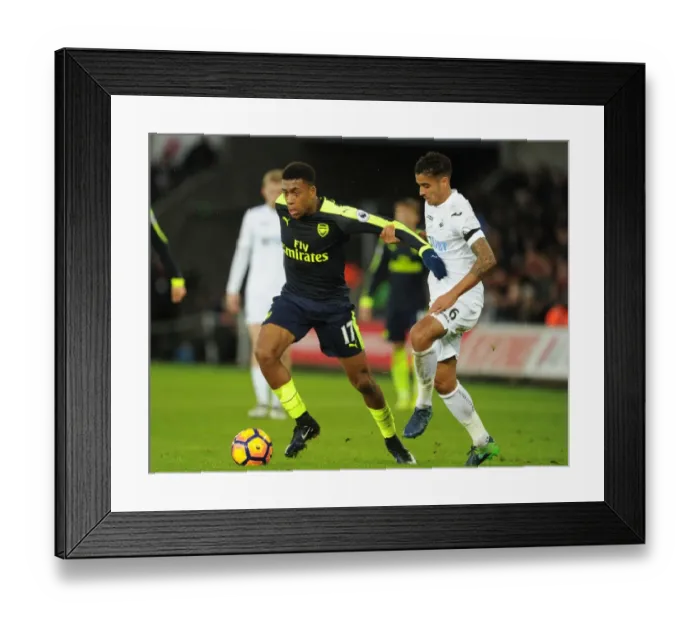 Framed Print : Intense Face-Off: Alex Iwobi vs. Kyle Naughton in Swansea vs. Arsenal Premier League Clash Framed Print : Intense Face-Off: Alex Iwobi vs. Kyle Naughton in Swansea vs. Arsenal Premier League Clash