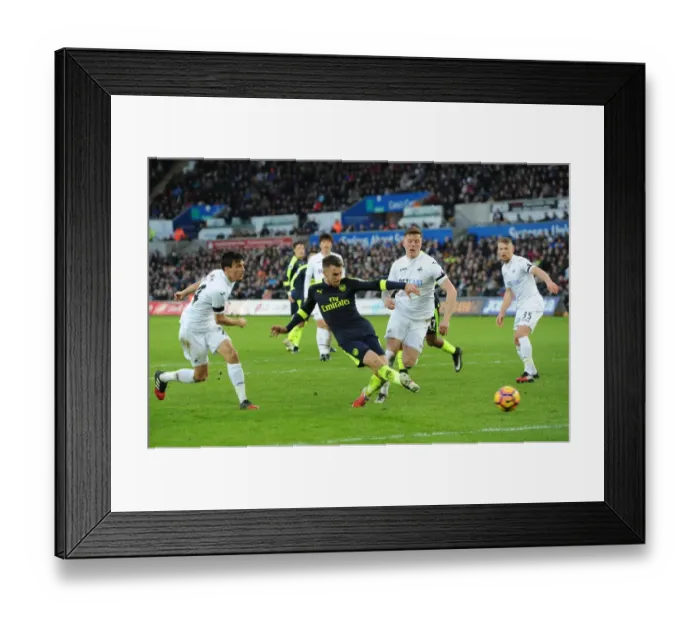 Framed Print : Arsenal's Aaron Ramsey Scores Under Pressure Against Swansea City (Swansea v Arsenal, Premier League 2016-17) Framed Print : Arsenal's Aaron Ramsey Scores Under Pressure Against Swansea City (Swansea v Arsenal, Premier League 2016-17)
