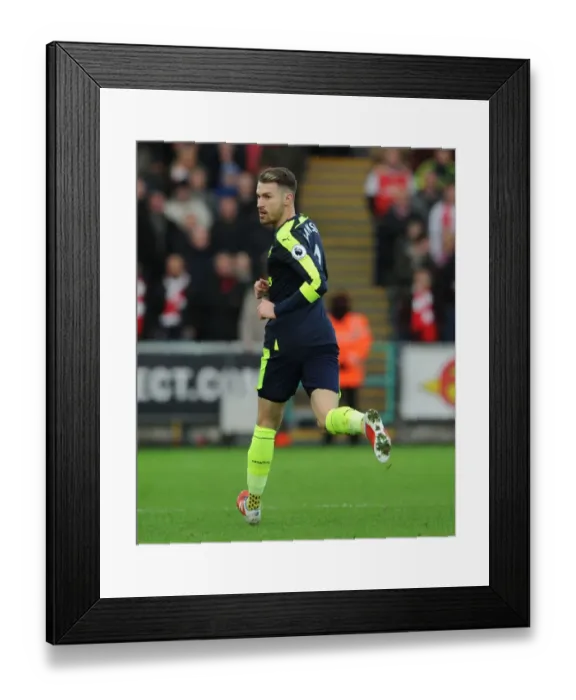 Framed Print : Aaron Ramsey in Action: Arsenal vs Swansea City (2016-17) Framed Print : Aaron Ramsey in Action: Arsenal vs Swansea City (2016-17)