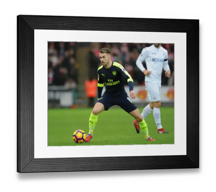 Framed Print : Arsenal's Aaron Ramsey in Action Against Swansea City (January 2017)
