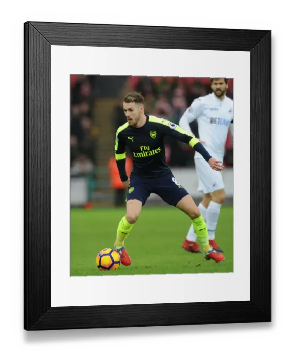 Framed Print : Aaron Ramsey in Action: Arsenal vs Swansea City (2016-17) Framed Print : Aaron Ramsey in Action: Arsenal vs Swansea City (2016-17)