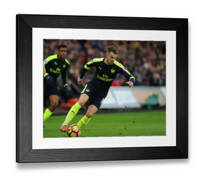 Framed Print : Arsenal's Aaron Ramsey in Action Against Swansea City (2016-17)