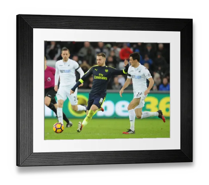 Framed Print : Arsenal's Aaron Ramsey Scores Past Swansea's Jack Cork - Swansea City vs Arsenal, Premier League 2016-17 Framed Print : Arsenal's Aaron Ramsey Scores Past Swansea's Jack Cork - Swansea City vs Arsenal, Premier League 2016-17