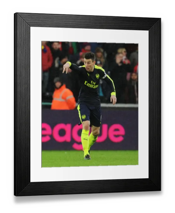 Framed Print : Laurent Koscielny Focuses in Swansea City vs Arsenal Premier League Clash