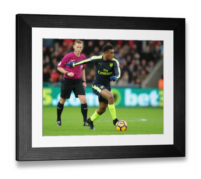 Framed Print : Arsenal's Alex Iwobi in Action against Swansea City (Premier League 2016-17) Framed Print : Arsenal's Alex Iwobi in Action against Swansea City (Premier League 2016-17)