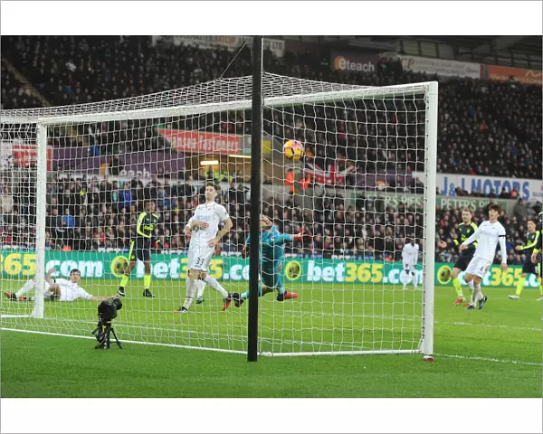 Iwobi Scores Deflected Goal Against Former Team-Mate Fabianski for Arsenal at Swansea