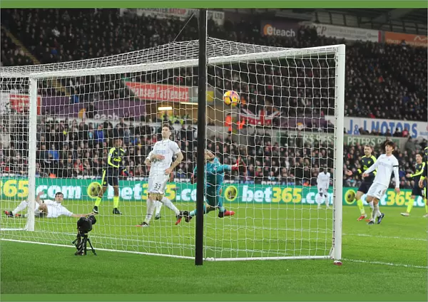 Iwobi Scores Deflected Goal Against Former Team-Mate Fabianski for Arsenal at Swansea