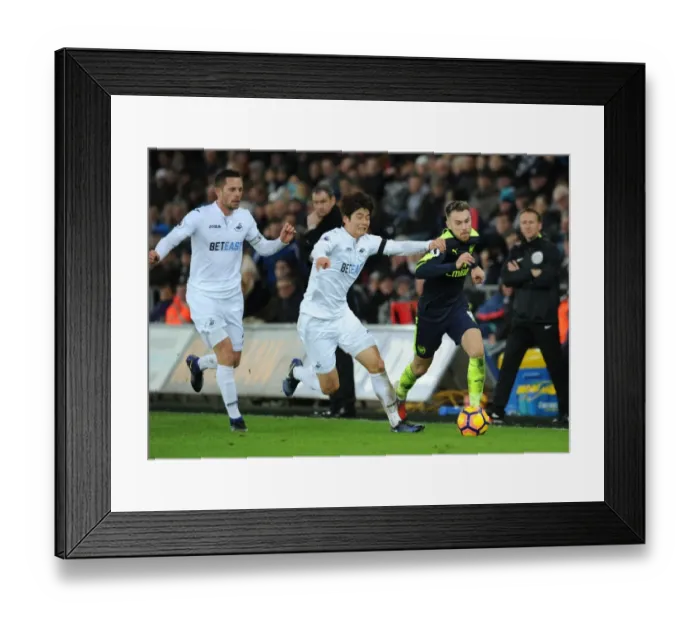 Framed Print : Arsenal's Aaron Ramsey Scores Past Swansea's Ki and Sigurdsson (January 2017)