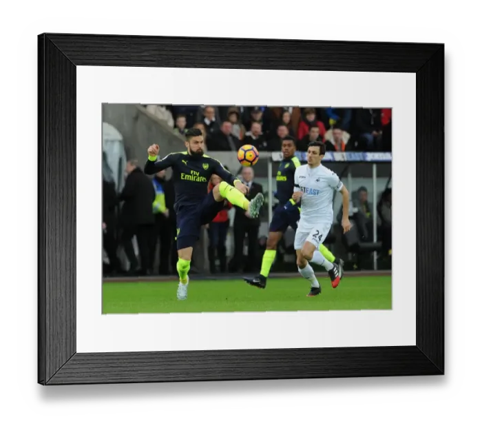 Framed Print : Olivier Giroud (Arsenal) Jack Cork (Swansea). Swansea City 0: 4 Arsenal. Premier League Framed Print : Olivier Giroud (Arsenal) Jack Cork (Swansea). Swansea City 0: 4 Arsenal. Premier League