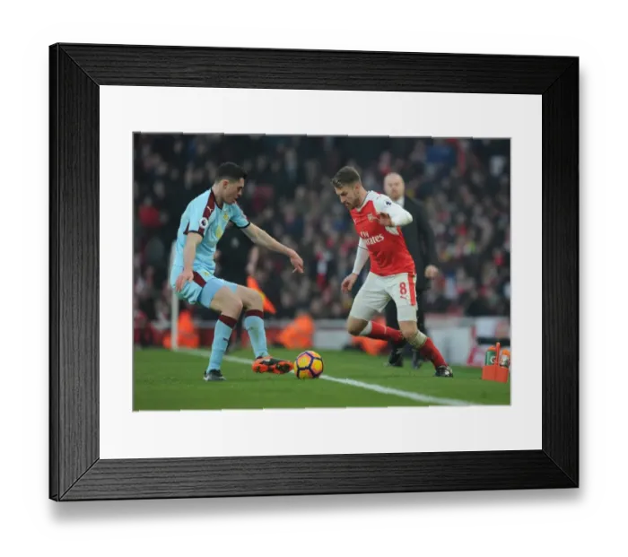 Framed Print : Arsenal's Ramsey Clashes with Burnley's Keane in Premier League Showdown Framed Print : Arsenal's Ramsey Clashes with Burnley's Keane in Premier League Showdown
