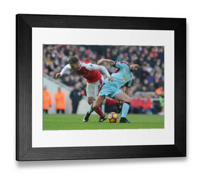 Framed Print : Arsenal vs. Burnley: Ramsey vs. Boyd Battle in the Premier League
