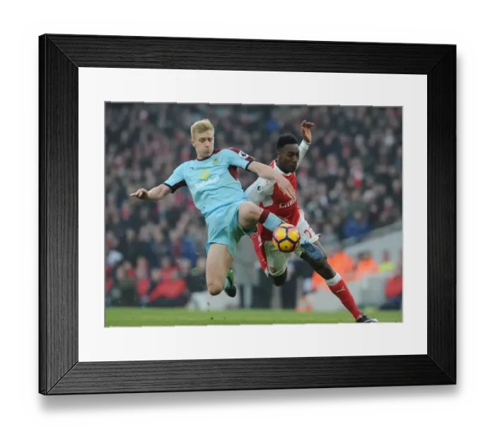 Framed Print : Arsenal vs Burnley: Intense Battle Between Danny Welbeck and Ben Mee in the Premier League Framed Print : Arsenal vs Burnley: Intense Battle Between Danny Welbeck and Ben Mee in the Premier League