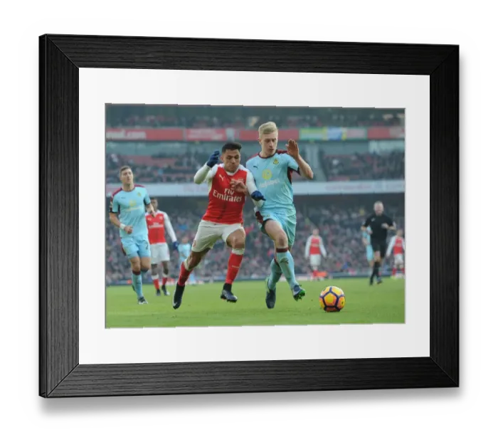 Framed Print : Arsenal vs Burnley: Clash between Sanchez and Mee in the Premier League