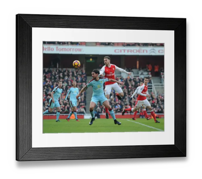 Framed Print : Arsenal vs Burnley: Ramsey vs Boyd Clash in Premier League Showdown