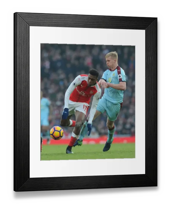 Framed Print : Intense Face-Off: Iwobi vs Mee - Arsenal's Battle Against Burnley Framed Print : Intense Face-Off: Iwobi vs Mee - Arsenal's Battle Against Burnley