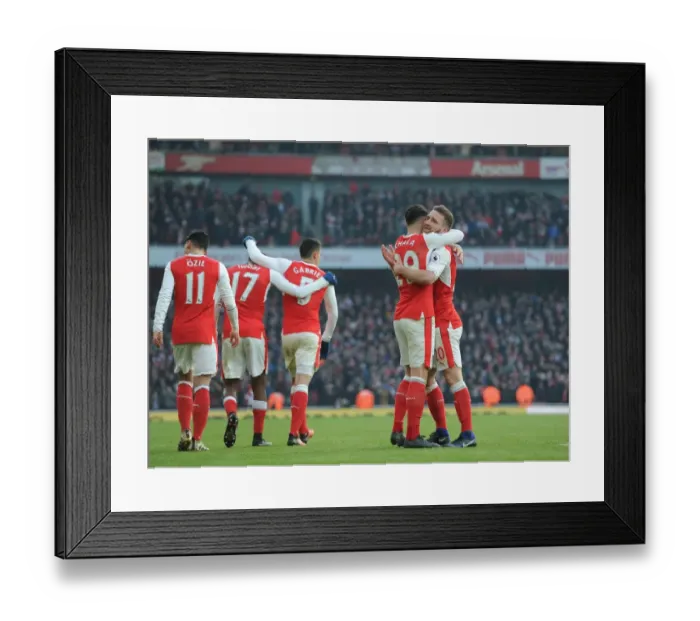 Framed Print : Arsenal's Mustafi and Xhaka Celebrate First Goal Against Burnley (2016-17)