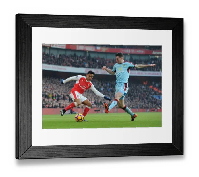 Framed Print : Alexis Sanchez (Arsenal) Michael Keane (Burnley). Arsenal 2: 1 Burnley. Premier League Framed Print : Alexis Sanchez (Arsenal) Michael Keane (Burnley). Arsenal 2: 1 Burnley. Premier League