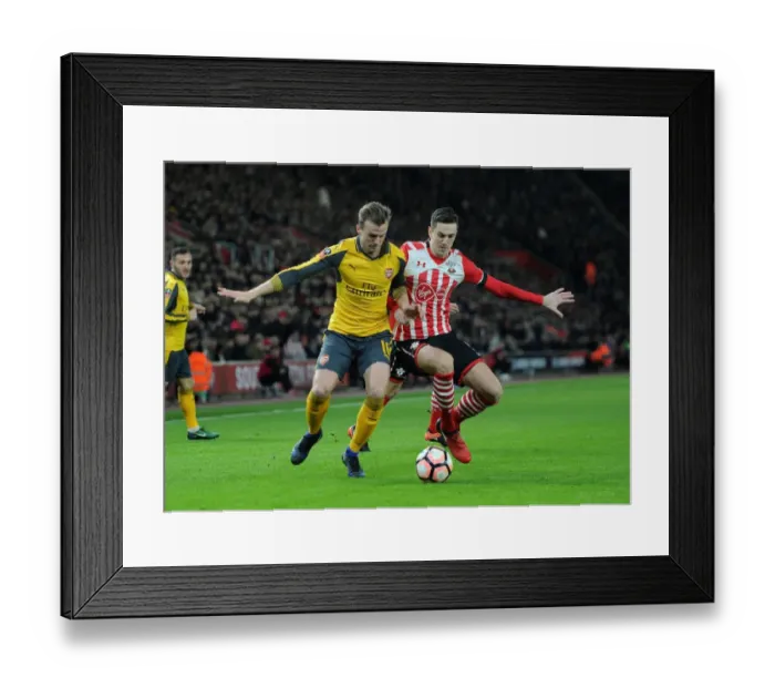 Framed Print : Rob Holding vs Florin Gardos: Clash at the FA Cup Fourth Round - Southampton vs Arsenal Framed Print : Rob Holding vs Florin Gardos: Clash at the FA Cup Fourth Round - Southampton vs Arsenal