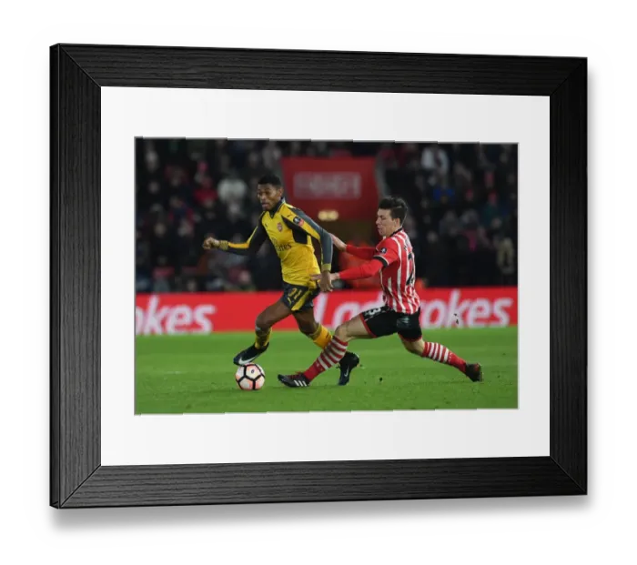 Framed Print : Jeff Reine-Adelaide vs Jack Stephens: Clash in the FA Cup Fourth Round - Southampton vs Arsenal Framed Print : Jeff Reine-Adelaide vs Jack Stephens: Clash in the FA Cup Fourth Round - Southampton vs Arsenal