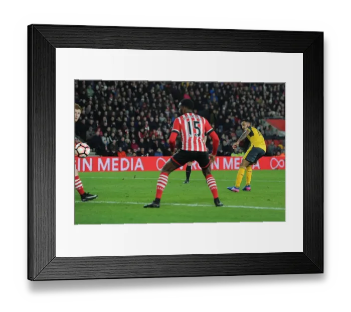 Framed Print : Theo Walcott's Brace: Arsenal Cruises Past Southampton in FA Cup Fourth Round Framed Print : Theo Walcott's Brace: Arsenal Cruises Past Southampton in FA Cup Fourth Round