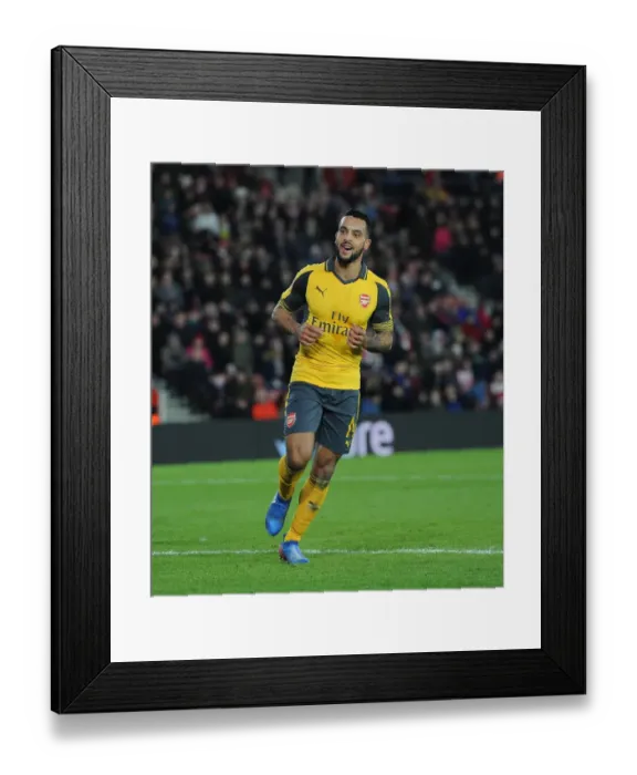 Framed Print : Theo Walcott's Brace: Arsenal Advance in FA Cup against Southampton Framed Print : Theo Walcott's Brace: Arsenal Advance in FA Cup against Southampton
