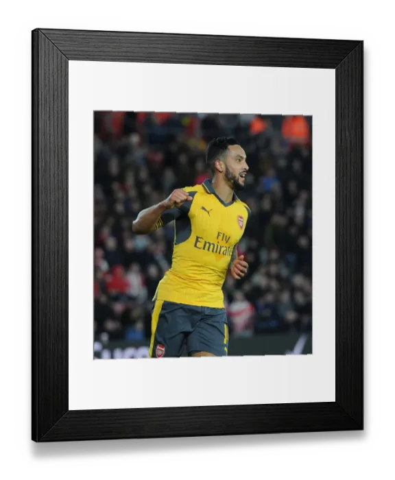 Framed Print : Theo Walcott's Brace: Arsenal Claims FA Cup Victory over Southampton
