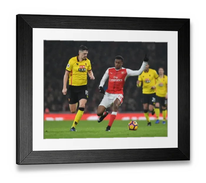 Framed Print : Arsenal vs. Watford: Intense Clash Between Iwobi and Cathcart in Premier League Match