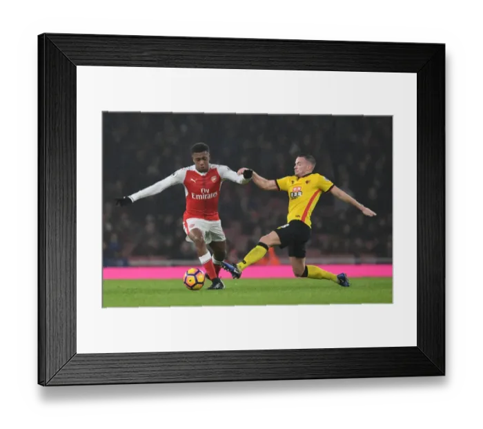 Framed Print : Intense Rivalry: Iwobi vs. Cleverley in Arsenal vs. Watford Premier League Showdown