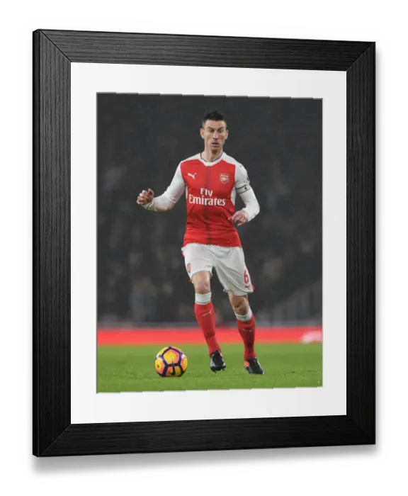 Framed Print : Arsenal's Koscielny in Action Against Watford, Premier League 2016-17