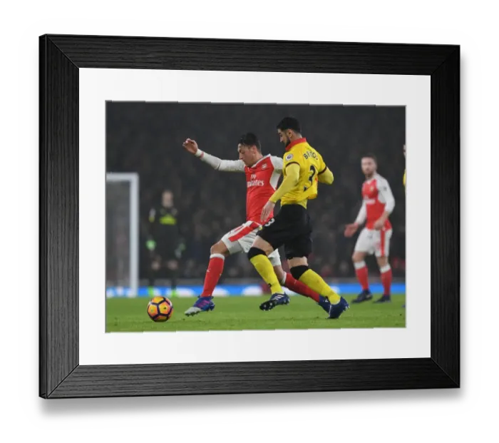 Framed Print : Arsenal vs Watford: Ozil Faces Off Against Britos in Intense Premier League Clash Framed Print : Arsenal vs Watford: Ozil Faces Off Against Britos in Intense Premier League Clash