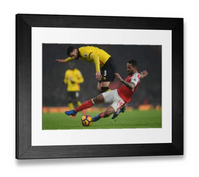 Framed Print : Intense Clash: Theo Walcott vs. Miguel Britos in Arsenal's Battle against Watford (Premier League 2016-17) Framed Print : Intense Clash: Theo Walcott vs. Miguel Britos in Arsenal's Battle against Watford (Premier League 2016-17)