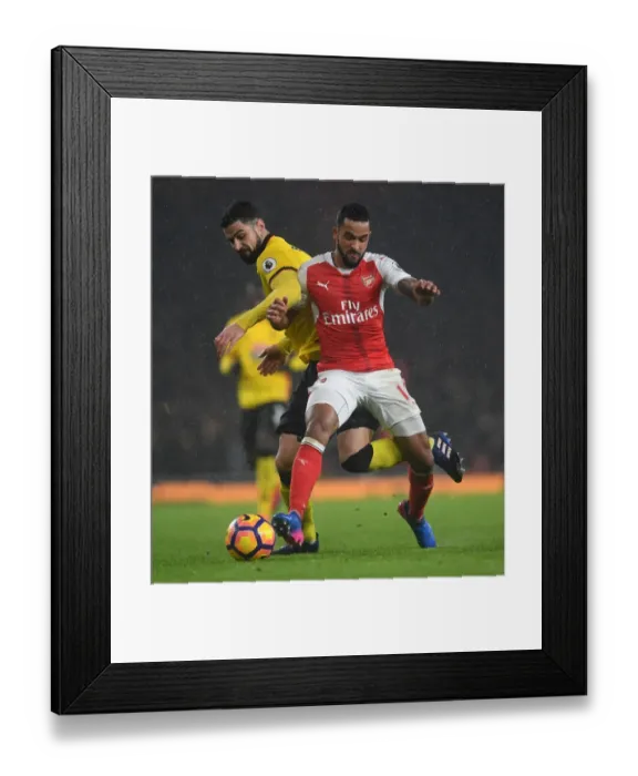 Framed Print : Arsenal vs. Watford: Theo Walcott Faces Off Against Miguel Britos Framed Print : Arsenal vs. Watford: Theo Walcott Faces Off Against Miguel Britos