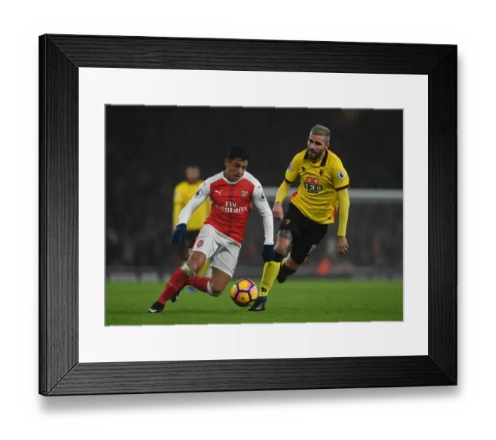 Framed Print : Arsenal vs. Watford: Alexis Sanchez Faces Off Against Valon Behrami in Premier League Clash